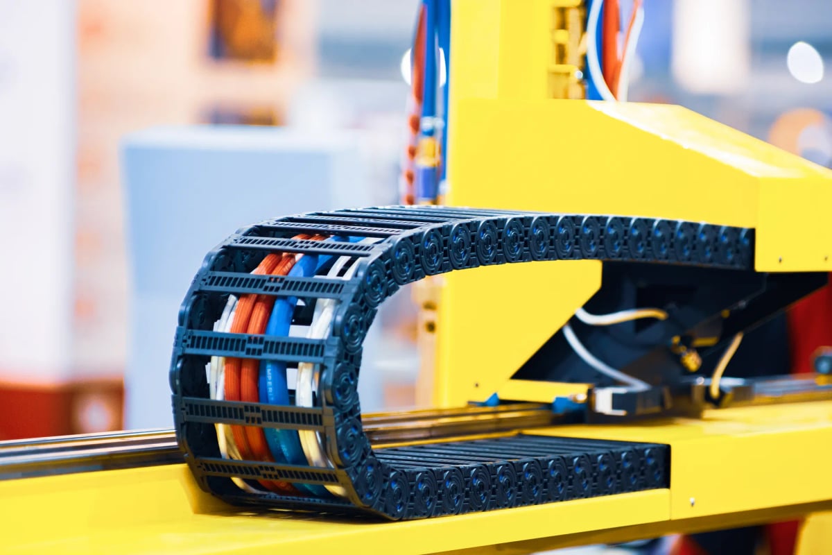 Industrial automation equipment with robotic arms on a manufacturing line